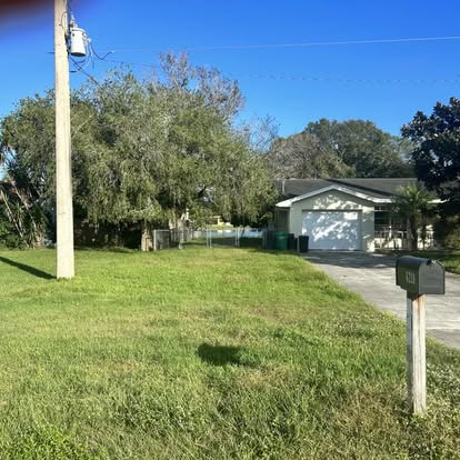 Clean yard in Fort Pierce FL after professional property cleanup by A1 Moto